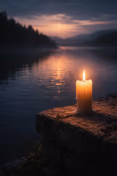 Single candle at dusk symbolizing early warning signals ignored until collapse follows.